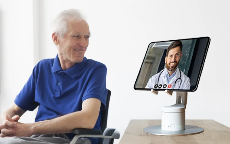 An elderly patient meeting a doctor online through kubi 2.0